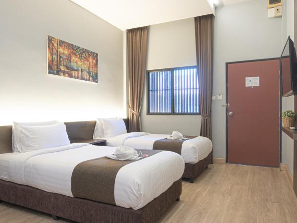 Tarnsiri Boutique Resort : photo 7 de la chambre chambre lits jumeaux deluxe