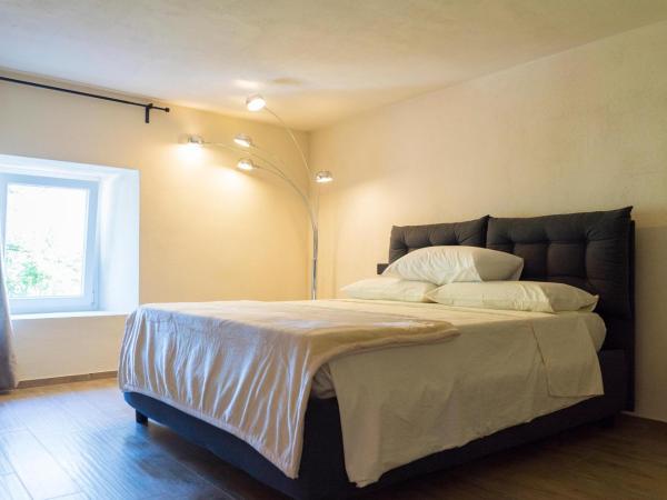 Tesoro Nascosto B&B : photo 1 de la chambre chambre lit queen-size avec baignoire spa