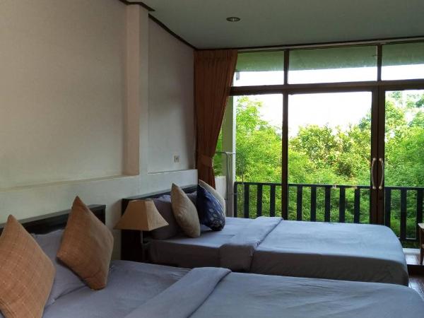 Faye Orchid Garden Resort : photo 3 de la chambre quadruple bungalow with garden view