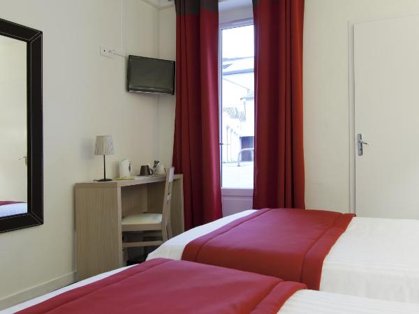 Logis Hotel Chateaubriand : photo 4 de la chambre chambre triple