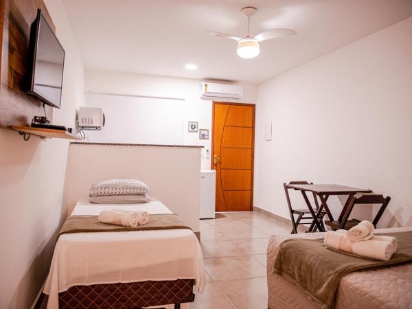 Búzios Conforto Guest House - 450 metros Rua das Pedras : photo 9 de la chambre chambre quadruple