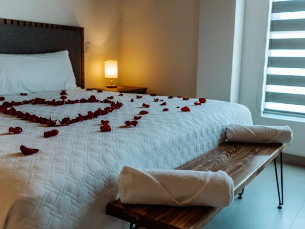 Loft Hotel Malecón Vallarta : photo 7 de la chambre suite supérieure lit king-size