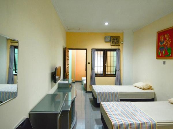 EC Pondokan : photo 1 de la chambre chambre quadruple