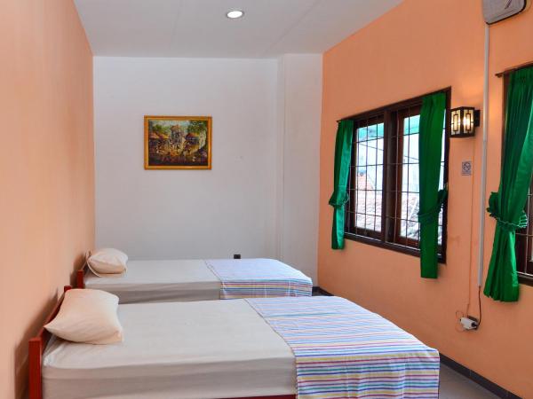 EC Pondokan : photo 5 de la chambre chambre lits jumeaux