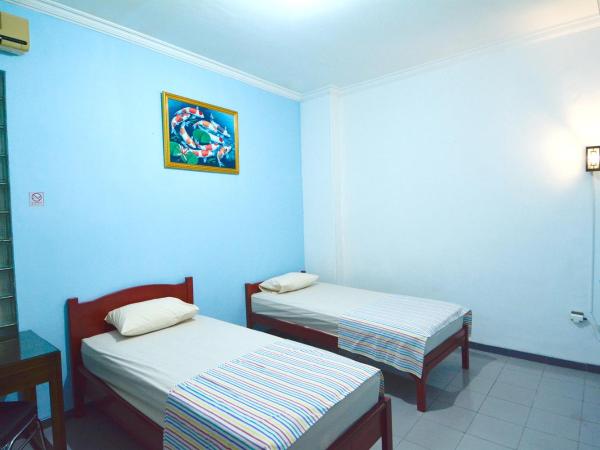 EC Pondokan : photo 4 de la chambre chambre lits jumeaux