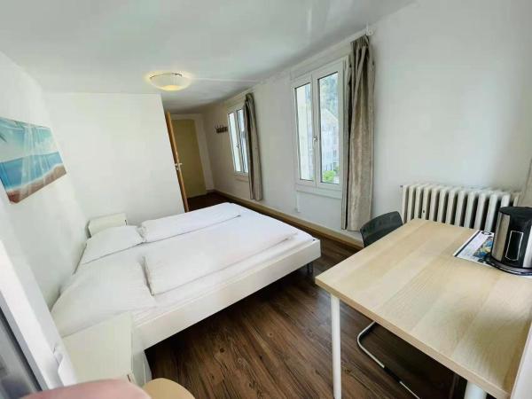 Interlaken Linda Inn Lodge : photo 2 de la chambre chambre double avec salle de bains privative