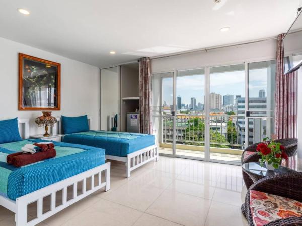 Parvena Hotel Sathorn : photo 5 de la chambre chambre lits jumeaux deluxe