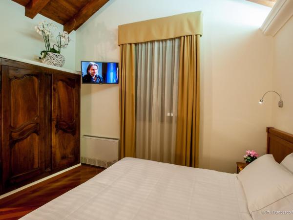 Hotel Flora : photo 3 de la chambre grande chambre simple