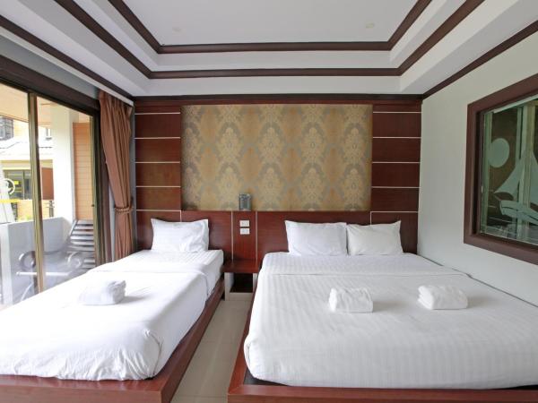 Phi Phi Andaman Beach Resort : photo 5 de la chambre chambre triple deluxe