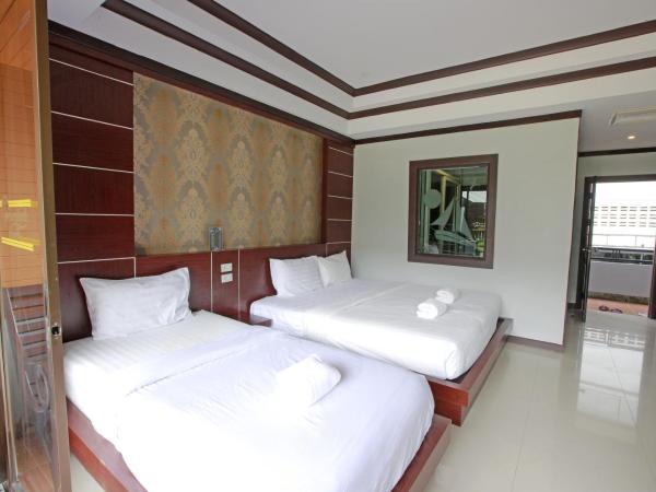 Phi Phi Andaman Beach Resort-SHA Plus : photo 4 de la chambre chambre triple deluxe