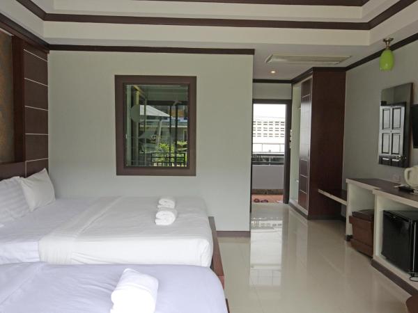 Phi Phi Andaman Beach Resort : photo 7 de la chambre chambre triple deluxe