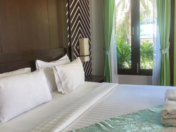 Phi Phi Andaman Beach Resort-SHA Plus : photo 7 de la chambre chambre double de luxe bungalow