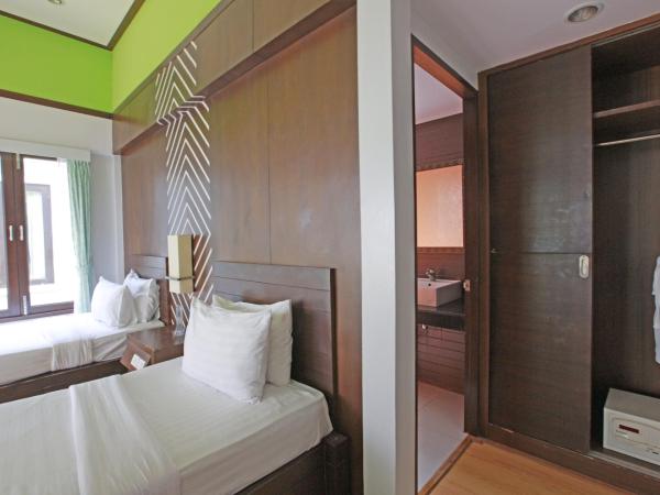 Phi Phi Andaman Beach Resort-SHA Plus : photo 9 de la chambre bungalow de luxe avec lits jumeaux