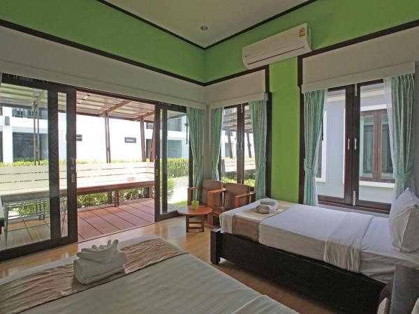 Phi Phi Andaman Beach Resort-SHA Plus : photo 7 de la chambre bungalow de luxe avec lits jumeaux