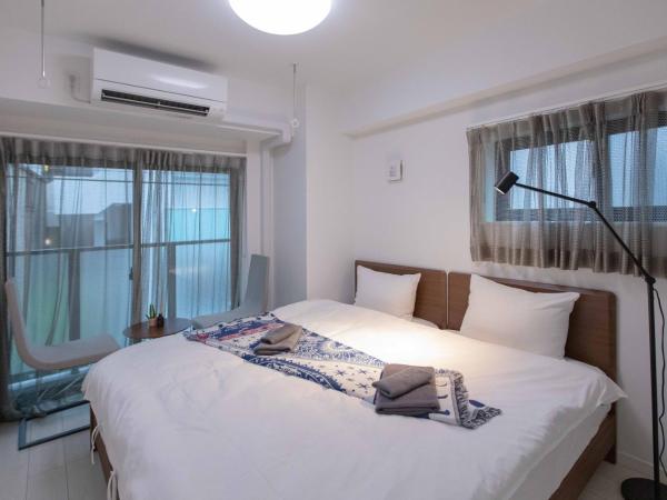 japan house sugamo : photo 7 de la chambre chambre lits jumeaux avec balcon