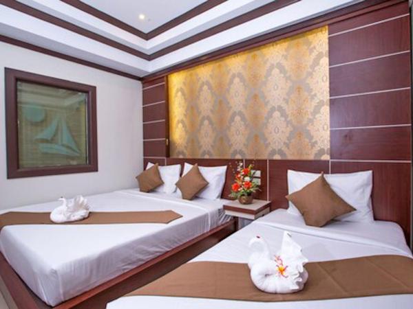Phi Phi Andaman Beach Resort-SHA Plus : photo 2 de la chambre chambre triple deluxe