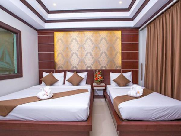 Phi Phi Andaman Beach Resort : photo 1 de la chambre chambre triple deluxe