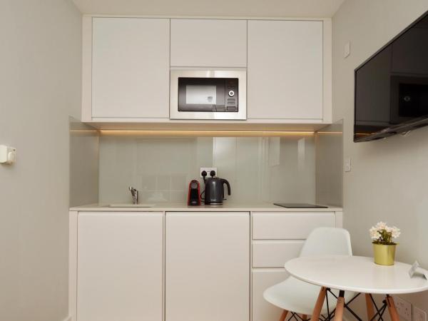 The Portobello Serviced Apartments by StayPrime : photo 4 de la chambre petit studio - sous-sol