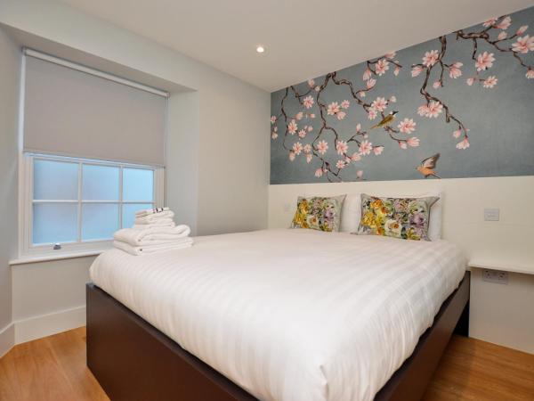 The Portobello Serviced Apartments by StayPrime : photo 1 de la chambre petit studio - sous-sol