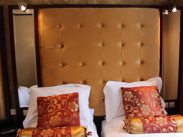 Hôtel des Buttes Chaumont : photo 1 de la chambre chambre triple