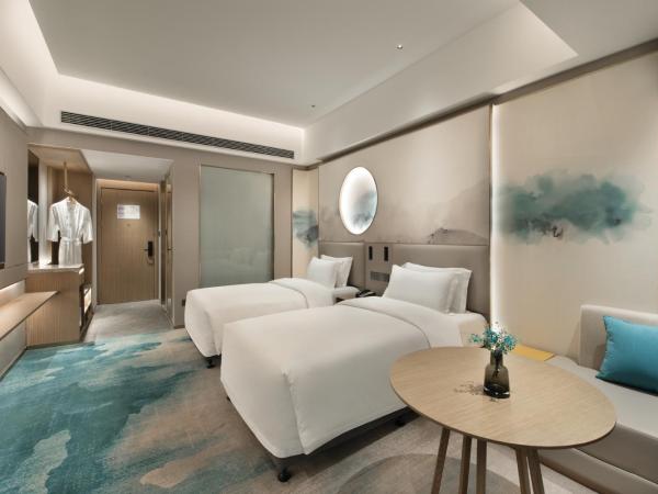 Shenzhen Grand Skylight Garden Hotel : photo 3 de la chambre chambre lits jumeaux - vue sur jardin