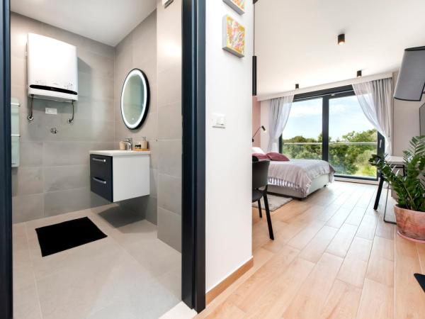 Luxury Residence Levante : photo 8 de la chambre studio lit king-size deluxe