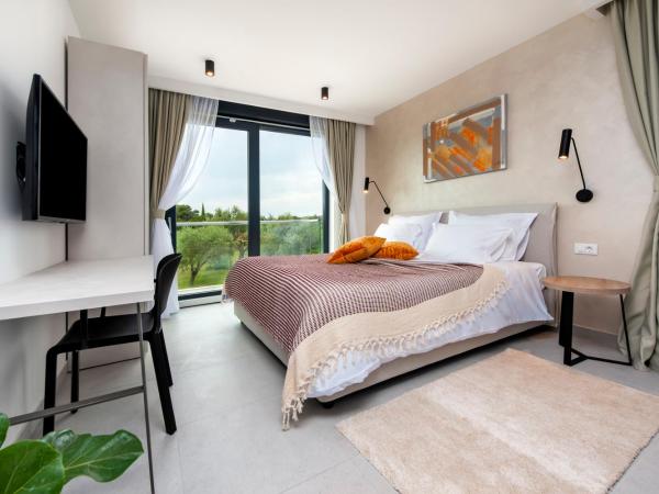 Luxury Residence Levante : photo 1 de la chambre studio lit king-size deluxe
