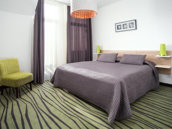 Rubin Wellness & Conference Hotel : photo 2 de la chambre appartement avec balcon