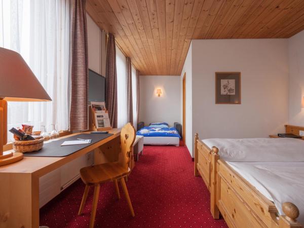 Waldhotel Arosa : photo 1 de la chambre chambre triple
