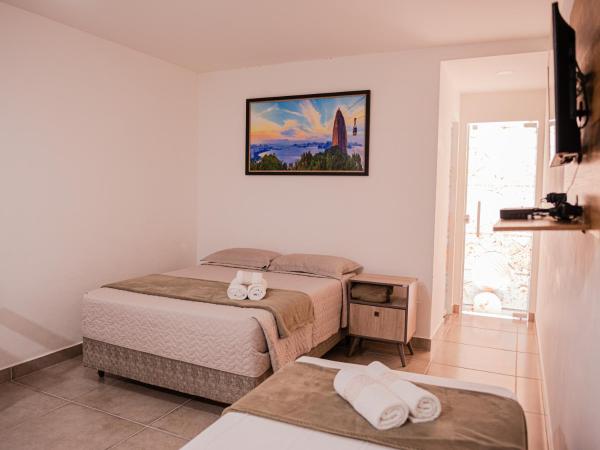 Búzios Conforto Guest House - 450 metros Rua das Pedras : photo 8 de la chambre chambre quadruple