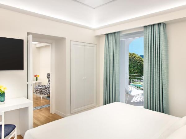 Pazziella Garden & Suites : photo 2 de la chambre suite avec terrasse et vue sur jardin