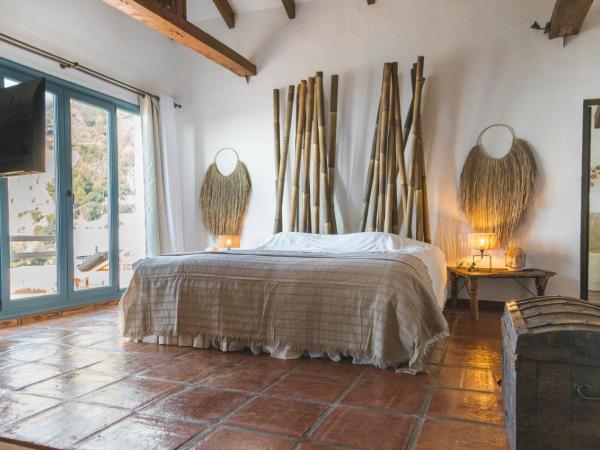 B&B Muse Marbella : photo 1 de la chambre suite lit king-size - vue sur mer