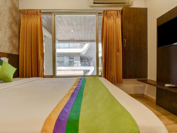 Treebo Kuval Inn : photo 7 de la chambre chambre double standard