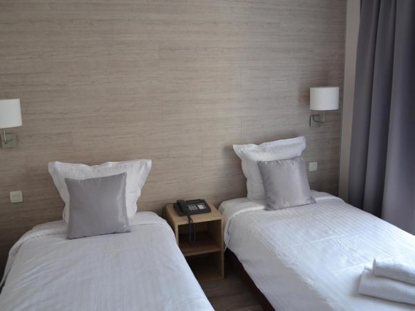 Au Bec Fin Hôtel : photo 4 de la chambre chambre lits jumeaux avec douche 