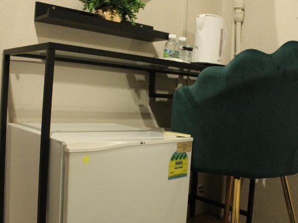 Ghazrin's Garuda Hotel : photo 4 de la chambre chambre double