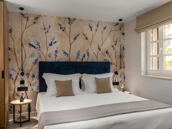 New York Luxury Suites : photo 1 de la chambre suite lit king-size avec balcon