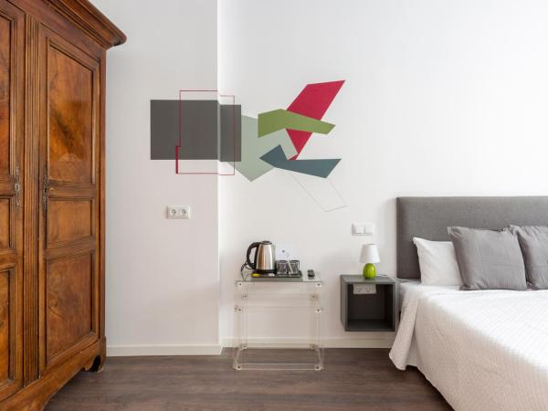 Ronda9 central suites : photo 3 de la chambre chambre lit queen-size deluxe