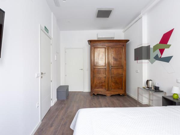 Ronda9 central suites : photo 2 de la chambre chambre lit queen-size deluxe