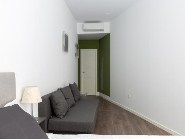 Ronda9 central suites : photo 3 de la chambre chambre deluxe avec 2 lits queen-size