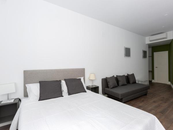 Ronda9 central suites : photo 4 de la chambre chambre deluxe avec 2 lits queen-size