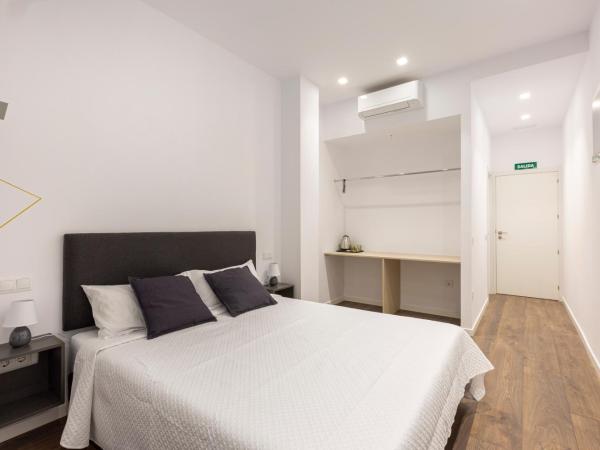 Ronda9 central suites : photo 2 de la chambre chambre double - vue sur jardin