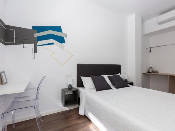 Ronda9 central suites : photo 7 de la chambre chambre double - vue sur jardin