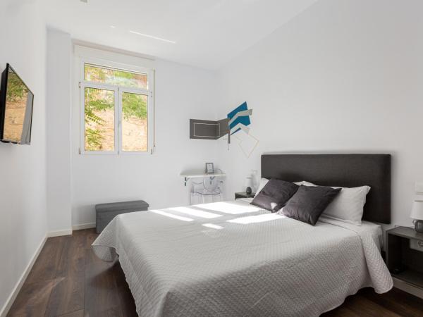 Ronda9 central suites : photo 1 de la chambre chambre double - vue sur jardin