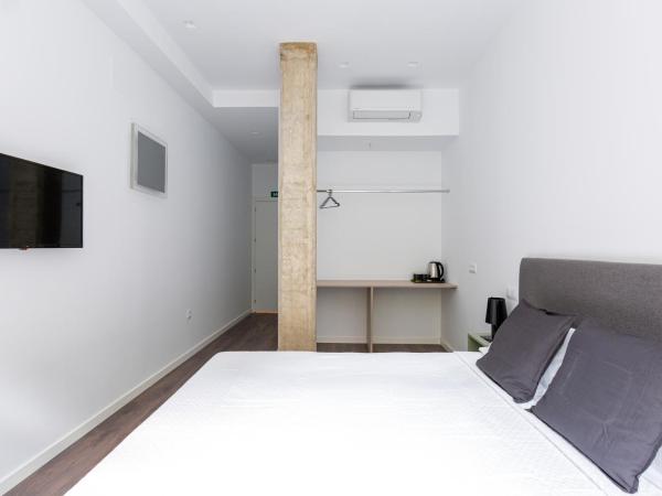 Ronda9 central suites : photo 5 de la chambre chambre double - vue sur jardin