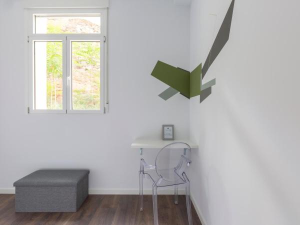 Ronda9 central suites : photo 3 de la chambre chambre double - vue sur jardin