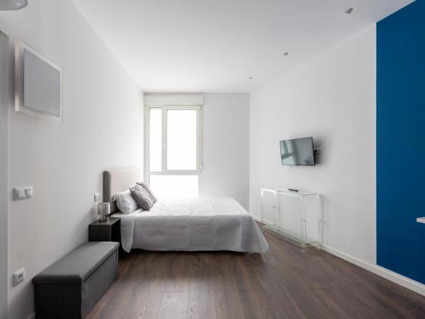 Ronda9 central suites : photo 6 de la chambre chambre deluxe avec 2 lits queen-size