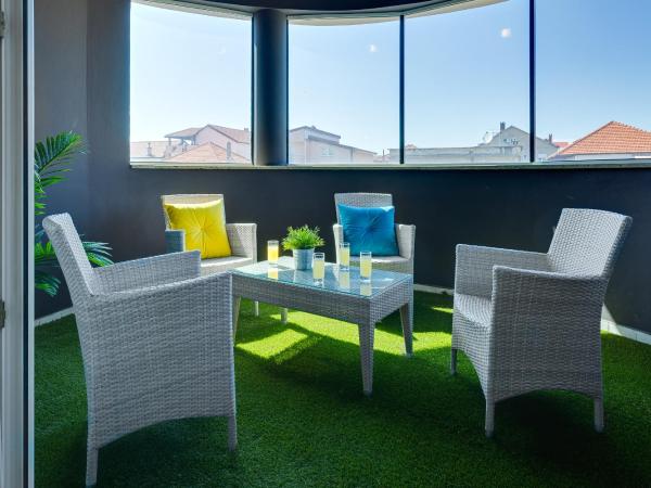 Hotel Sky : photo 4 de la chambre suite familiale avec balcon