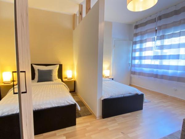 Schulz Apartments Zentrum : photo 4 de la chambre appartement - rez-de-chaussée