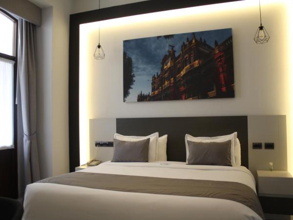 Hotel Boutique Casona de Santa Clara : photo 8 de la chambre suite avec balcon