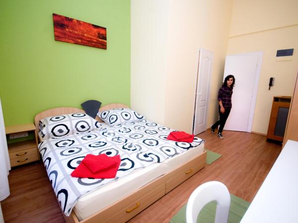 CentrÁlom Apartman : photo 5 de la chambre chambre double